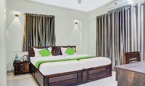 Economy Room | Desk, iron/ironing board - Treebo Tulip (Pune)