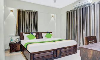 Economy Room | Desk, iron/ironing board