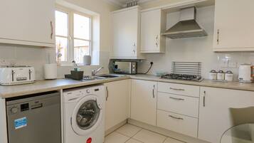 Fridge, dishwasher, cookware/dishes/utensils