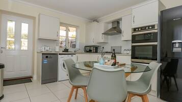 Fridge, dishwasher, cookware/dishes/utensils