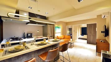 Fridge, microwave, coffee/tea maker, cookware/dishes/utensils