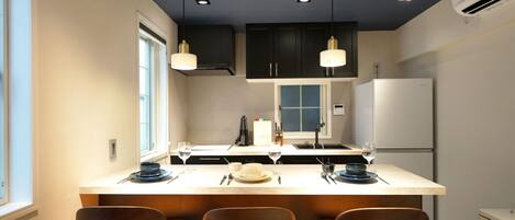 Fridge, microwave, dishwasher, coffee/tea maker