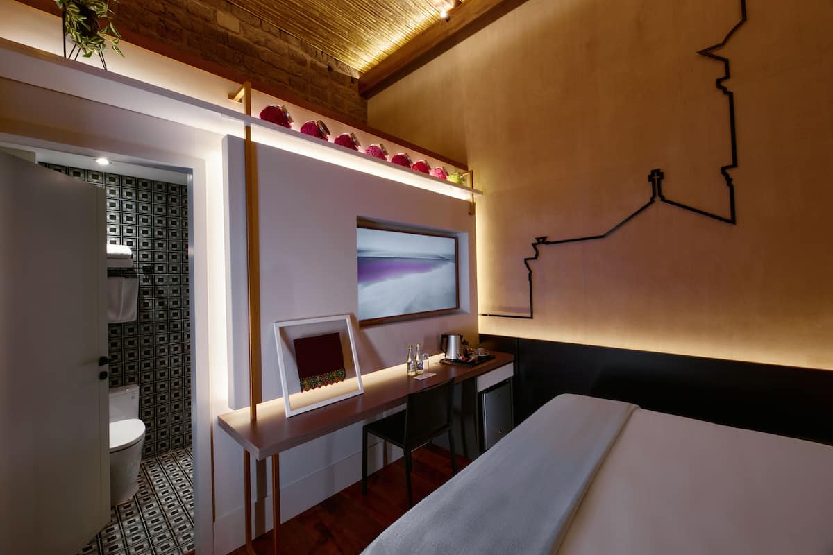 Classic Room, 1 Queen Bed | 1 bedroom, minibar, in-room safe, individually decorated