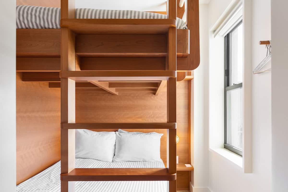 Double Bunk | Down comforters, memory foam beds, desk, blackout drapes
