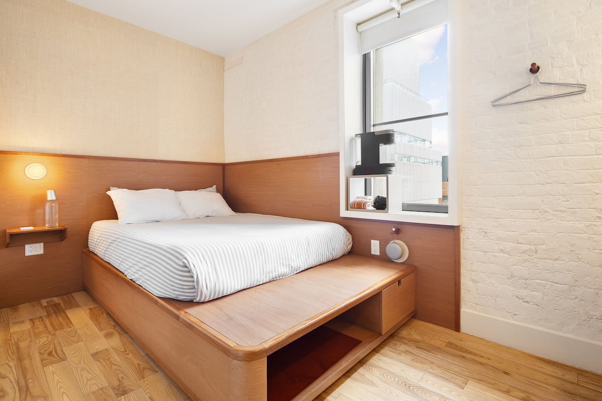 Studio Mini | Down comforters, memory foam beds, desk, blackout drapes