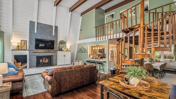 Smart TV, chimenea y futbolito