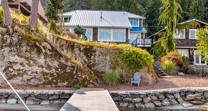 Lovely lakefront home with fireplace, dock, full kitchen, & washer/dryer
