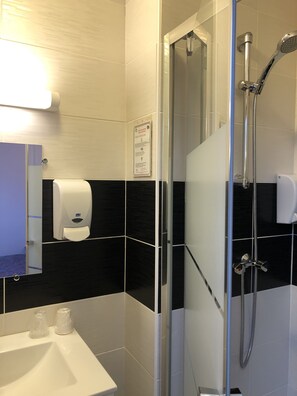 Shower, free toiletries, hair dryer, towels