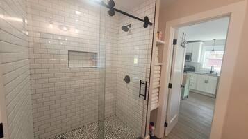 Shower, hair dryer, towels, soap
