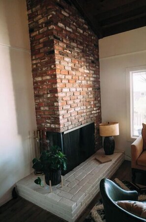 Smart TV, fireplace, books