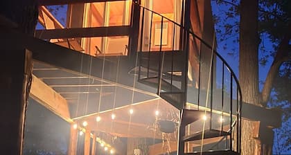 Riverfront Treehouse Camp