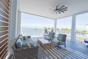 Terrace/patio - Luxury Waterfront Estate—Pool, Spa, Game Lounge, 2 Docks & Ramp Access—Gulfside (Marathon)