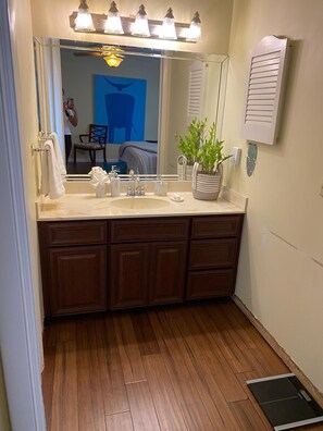 Bathtub, hair dryer, towels, soap