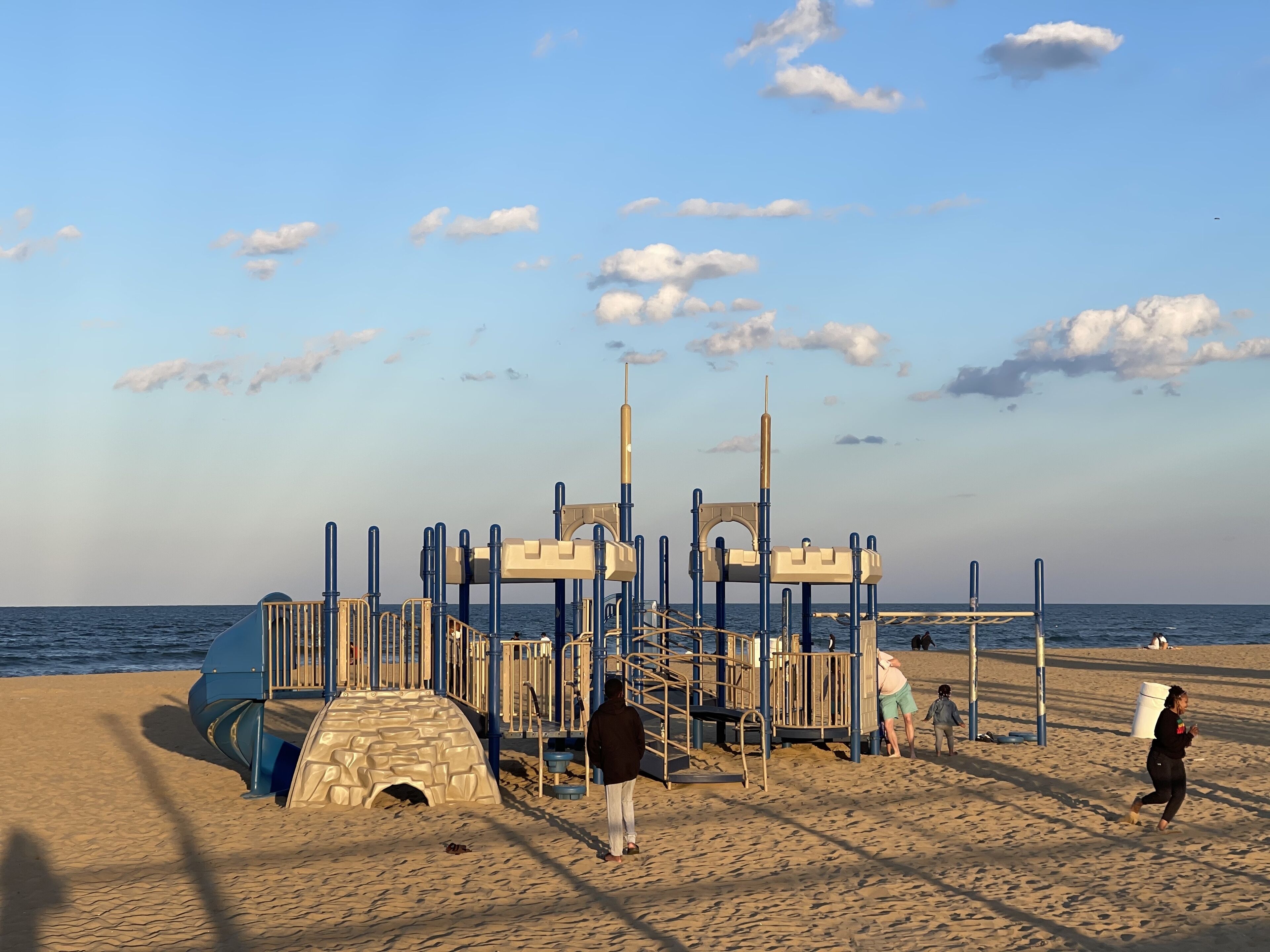 On the beach, sun-loungers