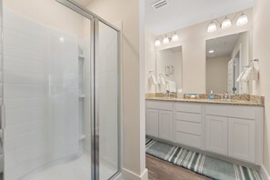 Combined shower/bathtub, towels, soap