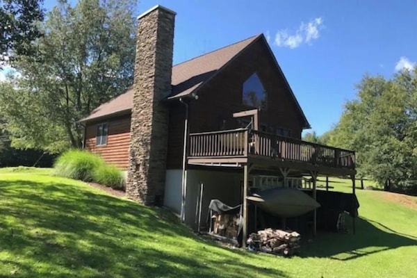 Aspen Lodge near Cherry Springs. Deck view to the backyard and the woods.