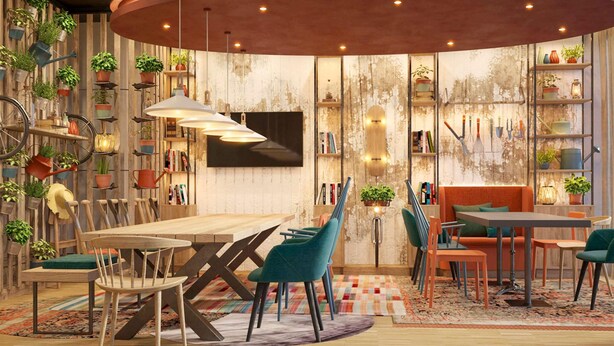 A modern dining area with wooden furniture, a central table, and a variety of potted plants. - Greet Wien City Nord  (Vienna)