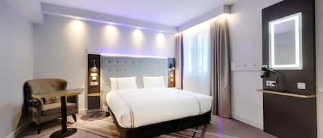 Habitación doble estándar | Insonorización y ropa de cama