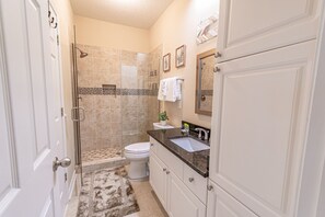 Combined shower/tub, hair dryer, towels, soap