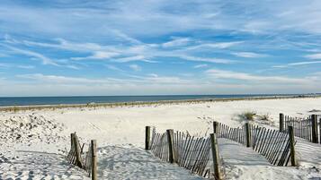 On the beach, sun loungers, beach towels