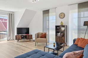 TV, stereo - Greatsiel - Gemütliche Obergeschosswohnung mit Balkon in Zweiter Reihe zum Wasser (Krummhörn)