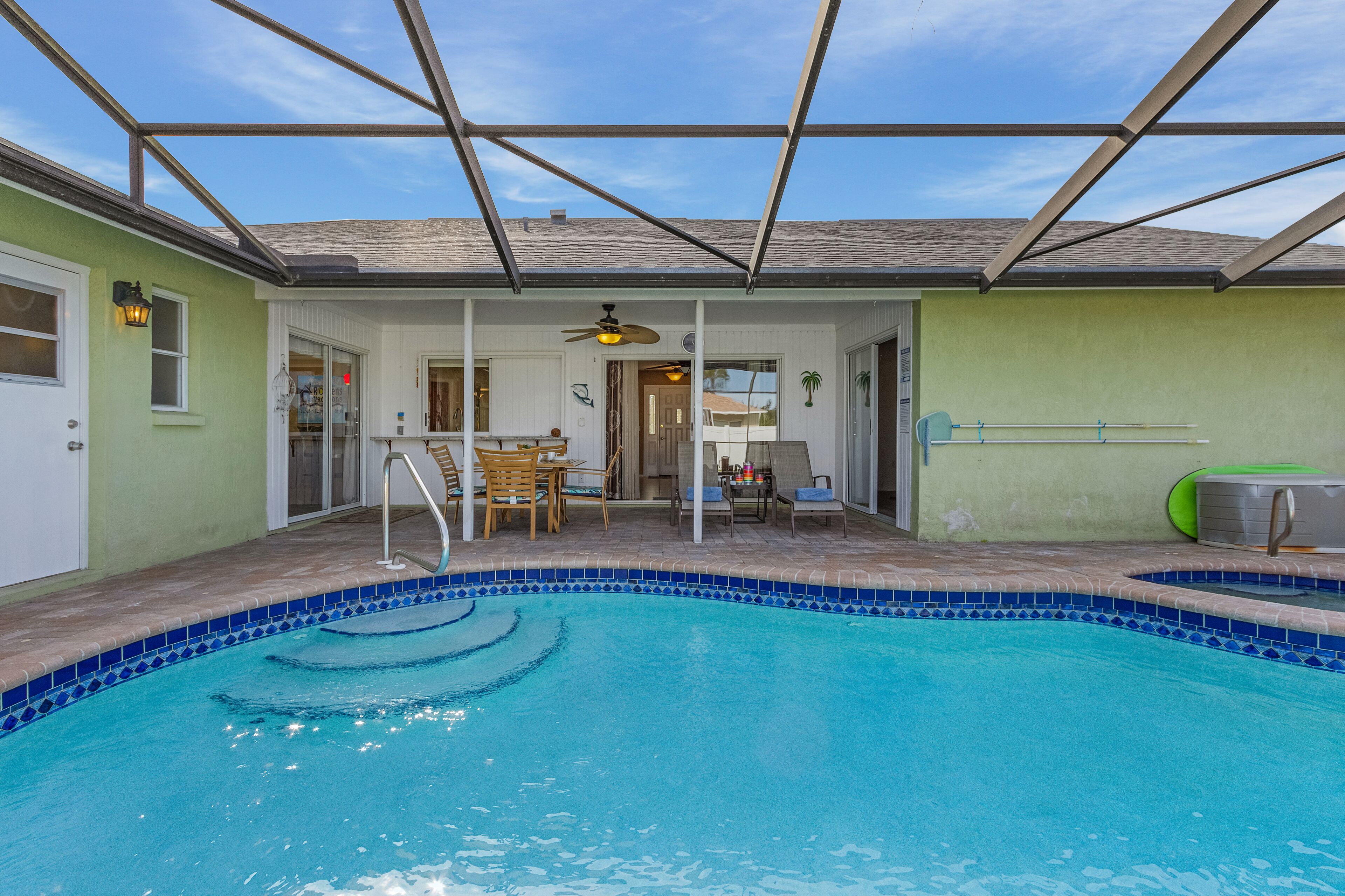 Backyard Oasis with large heated Saltwater Pool - Villa Water's Edge - Roelens Vacations