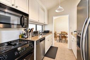Coffee/tea maker, fridge, microwave, oven
