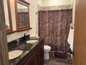 Bathtub, hair dryer, towels