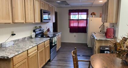 The Eagle's Nest is an oilfield building converted into a beautiful house right on the river.