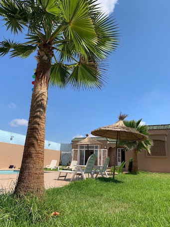 Terrace/patio. Escape to Luxury: Moroccan Villa w/Pool, Garden - Book Your Blissful Getaway Now
