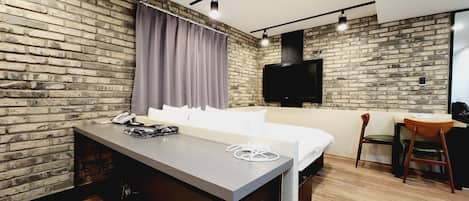 Deluxe Premium Room | Ropa de cama de alta calidad y camas con efecto memoria