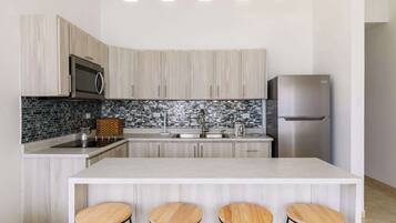 Fridge, microwave, stovetop, coffee/tea maker