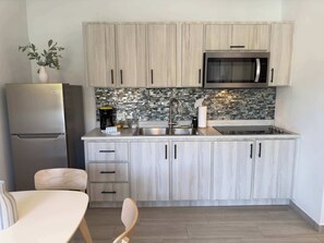 Microwave, stovetop, coffee/tea maker, toaster