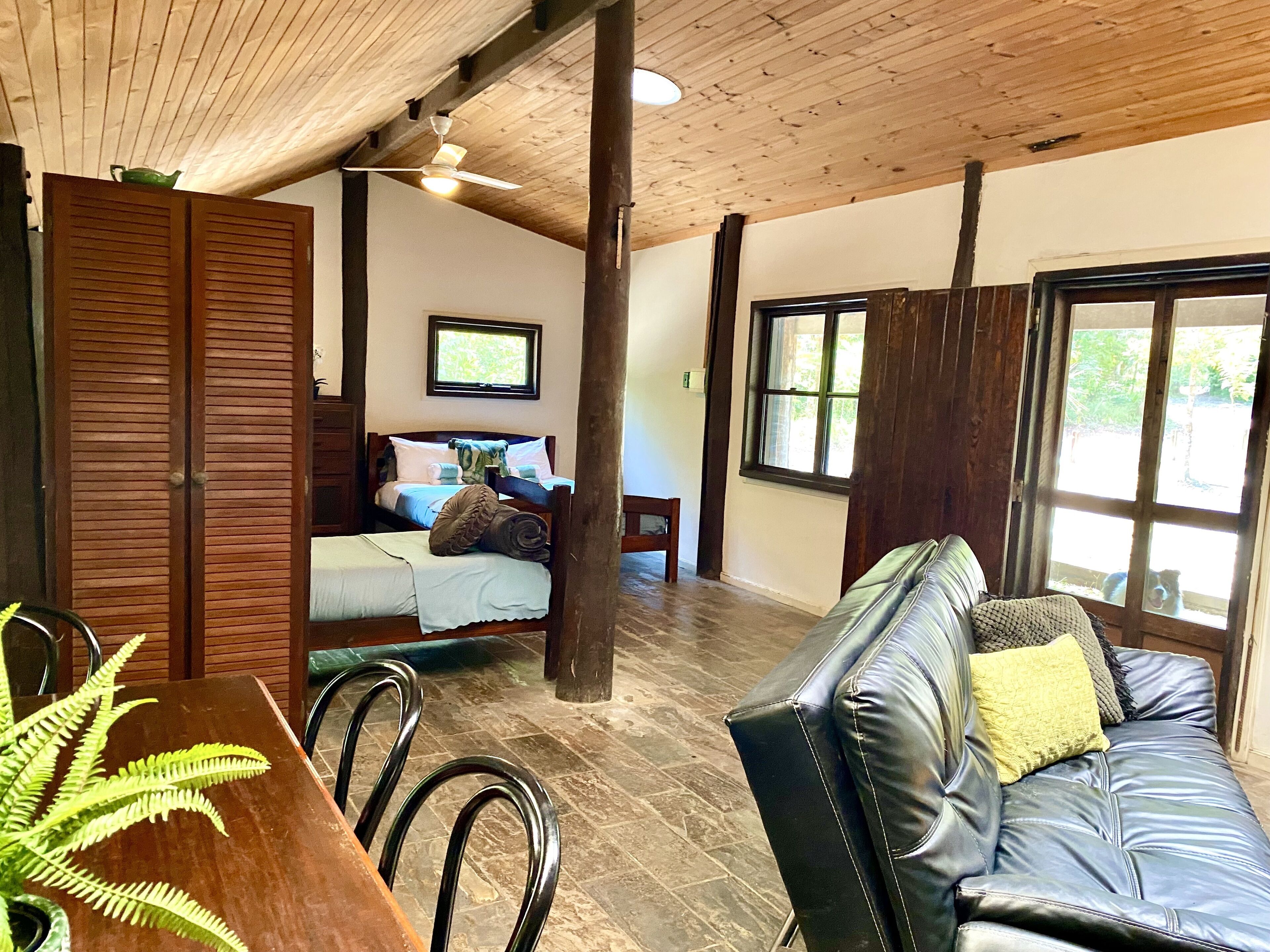 Pioneer Traditional Cabin | Premium bedding, individually decorated, individually furnished