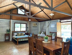 Banksia Family Cabin | Living area | LCD TV, DVD player - Ferns Hideaway Resort (Byfield)