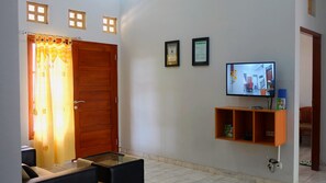 Family House | Living area | 21-inch LED TV with cable channels, TV