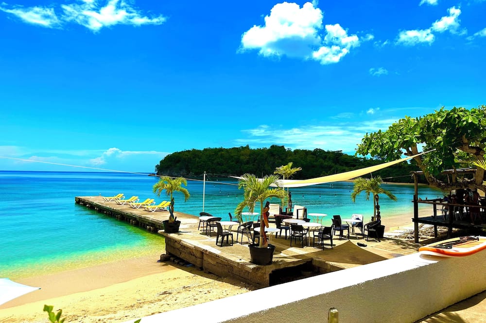 Sand And Tan Beach Hotel