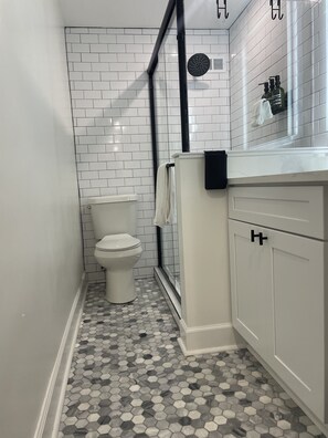 Shower, hair dryer, towels, soap