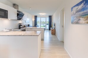 Réfrigérateur, four, plaque de cuisson, lave-vaisselle