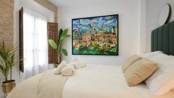 2 slaapkamers, een strijkplank/strijkijzer, internet, beddengoed