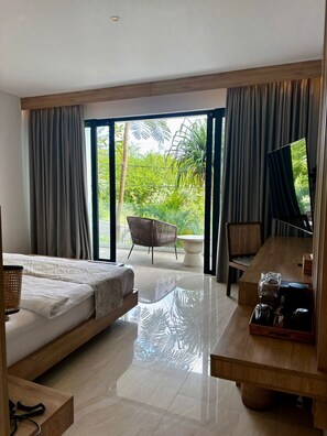 Grand Double Room | Premium bedding, memory foam beds, in-room safe, desk - Truntum Boutique Mandalika (Kuta)