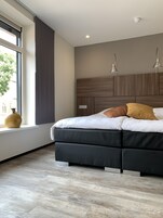 Comfort Room | In-room safe, desk, laptop workspace, iron/ironing board