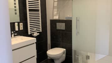 Comfort Room | Bathroom | Shower, rainfall showerhead, hair dryer, towels