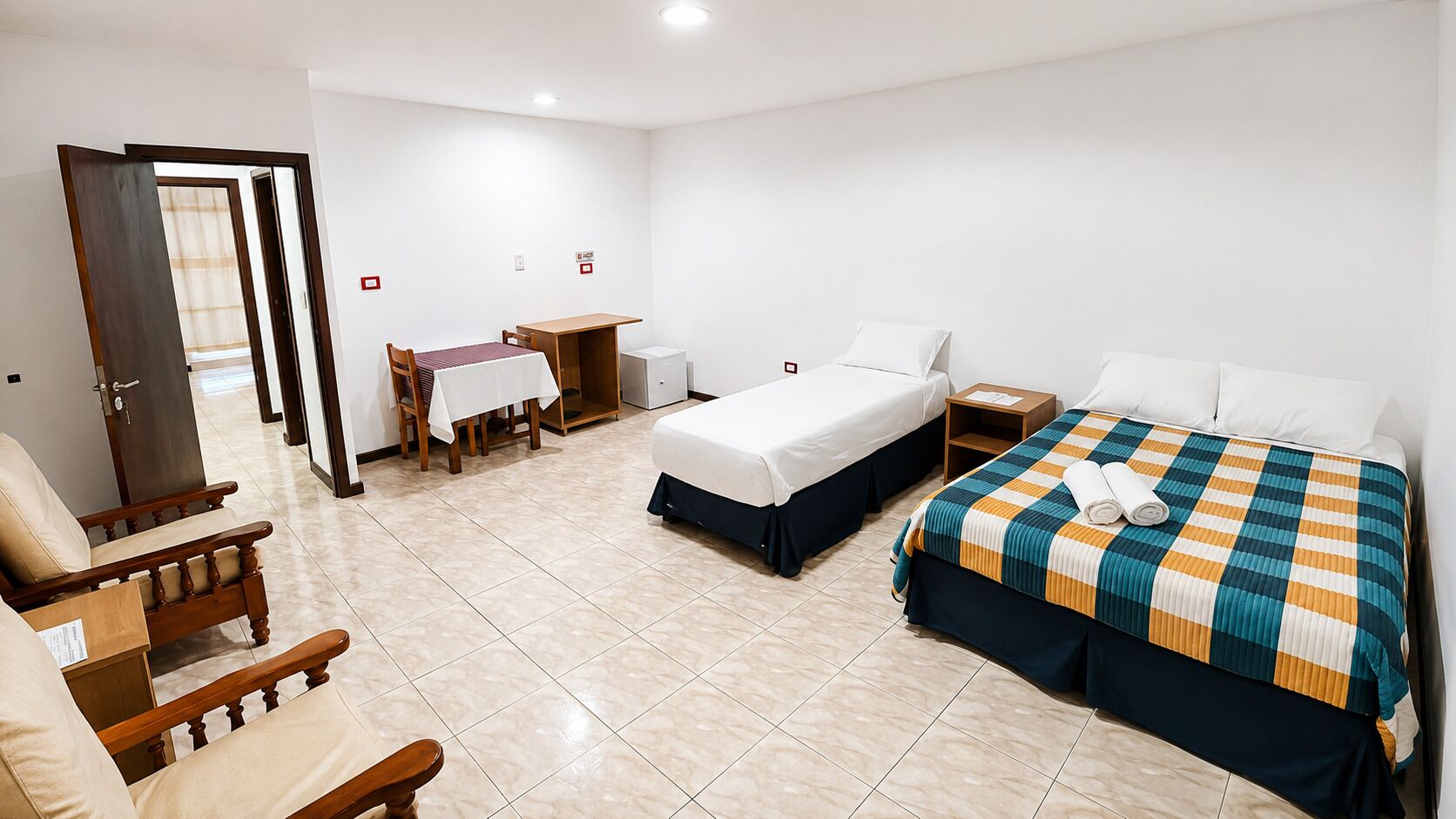 Habitación clásica | Ropa de cama de alta calidad y edredón 