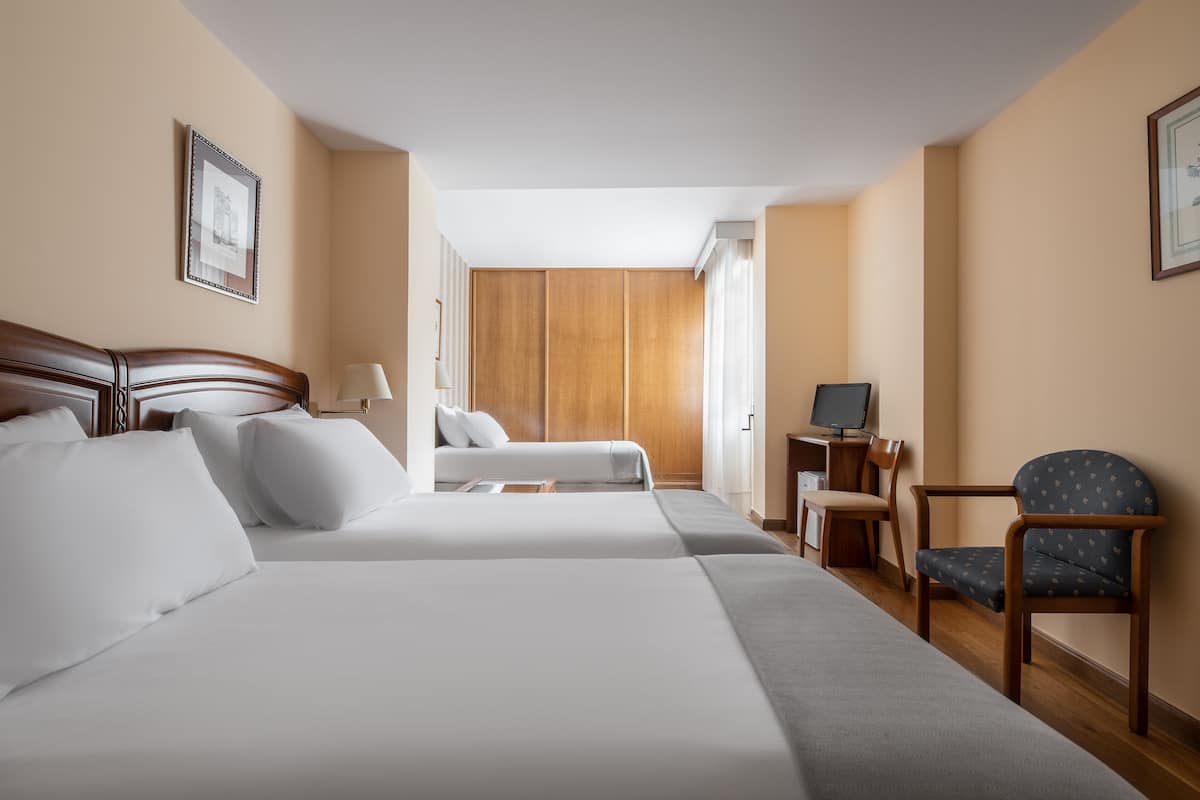 Family Room | In-room safe, desk, laptop workspace, blackout curtains