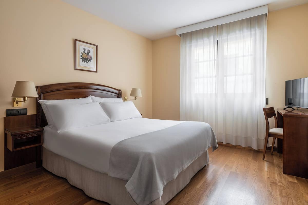 In-room safe, desk, laptop workspace, blackout drapes