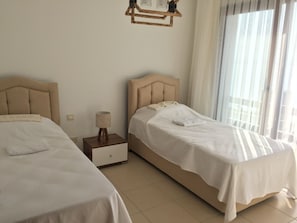 2 bedrooms, Egyptian cotton sheets, premium bedding, memory-foam beds