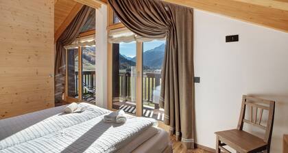 Ferienwohnung "Baita Emilia e Daniele 12 13" nahe Pisten mit 2 Balkonen & WLAN