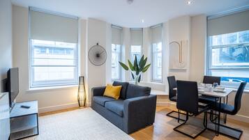 42-inch flat-screen TV with satellite channels, TV