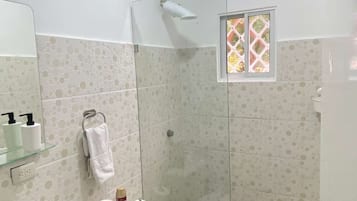 Bathtub, hair dryer, towels